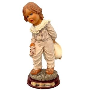 Vintage Louis Dionne Figurine Child Holding Flowers and Hat